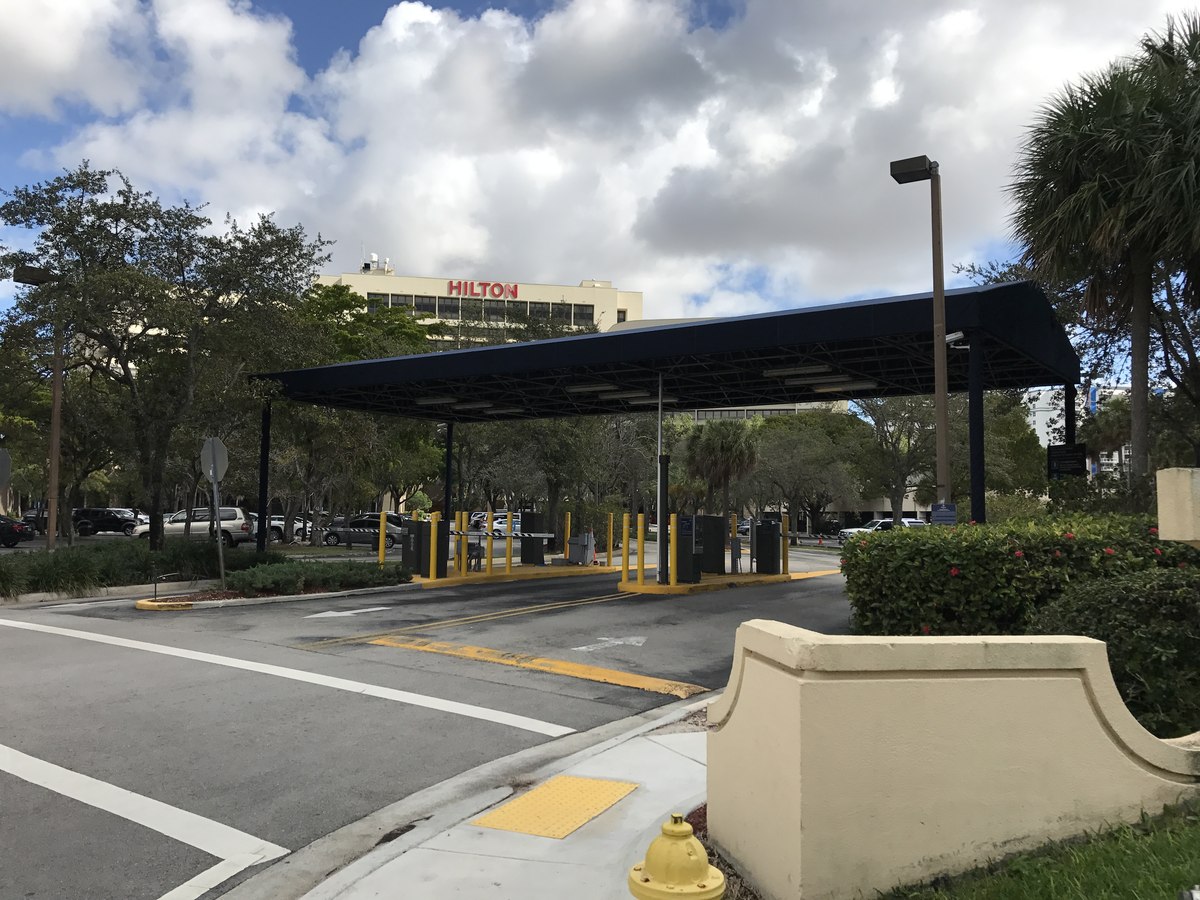 Dark canopy over a vehicle entrance