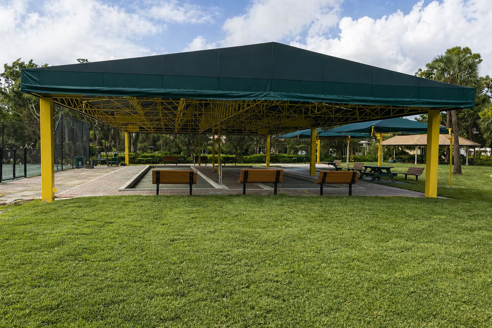 Green canopy over an outdoor recreation area