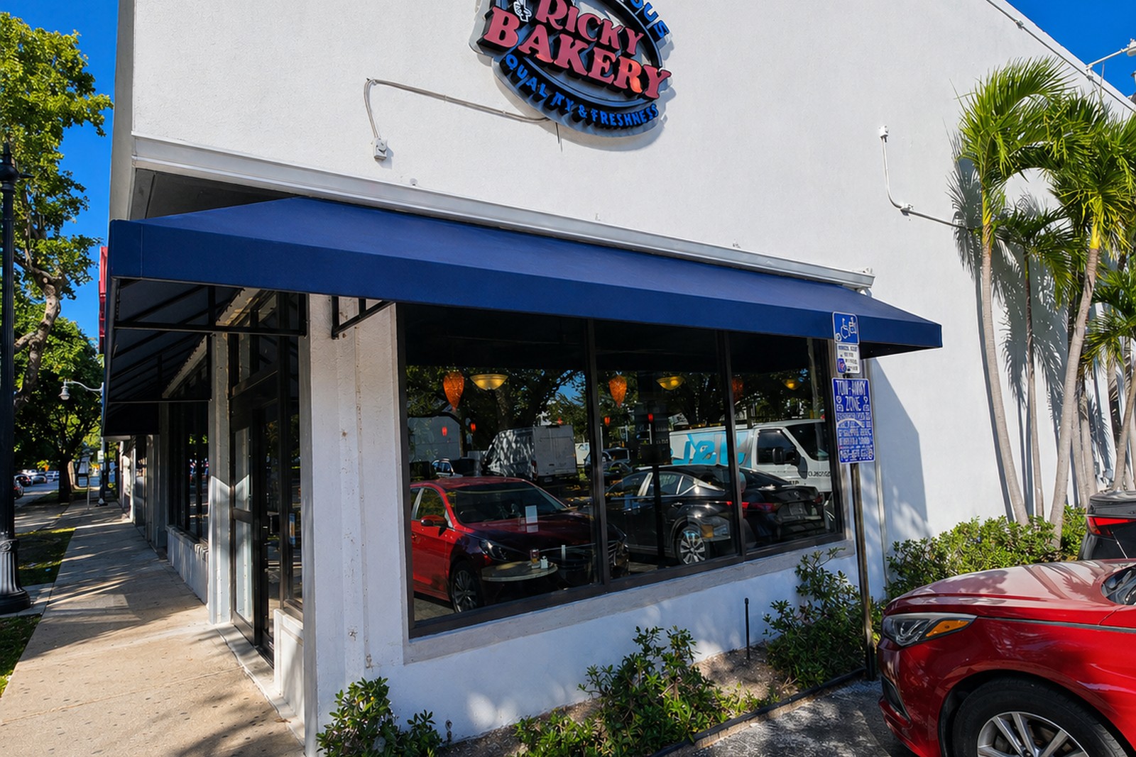 Blue awning over a bakery storefront